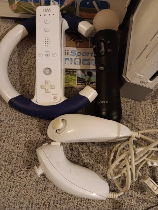 Consola Nintendo Wii + Juegos y Accesorios