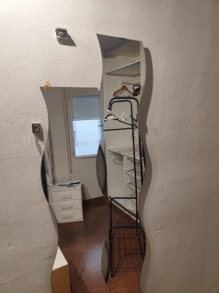 Espejo de pared ondulado