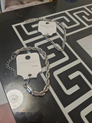 Pulseras de hombre plateadas