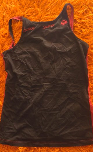 Conjunto falda negra con mariquitas y camiseta