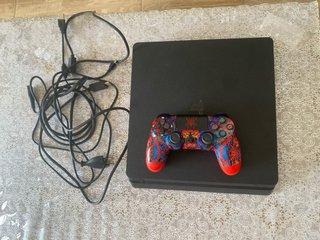 PS4 1TB (PlayStation 4) con Mando Multicolor