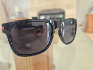Gafas de sol Prada negras brillantes