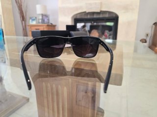 Gafas de sol Prada negras brillantes