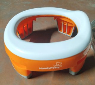 Orinal portatile HandyPotty arancione