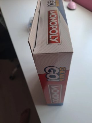 Monopoly Grab & Go Gioco da Tavolo