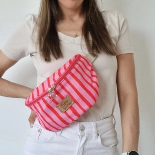 Riñonera impermeable con rayas rosa y rojo