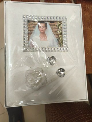 Álbum de fotos de boda con adornos
