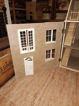 Casa de muñecas de madera