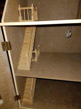 Casa de muñecas de madera