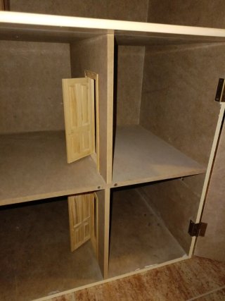 Casa de muñecas de madera