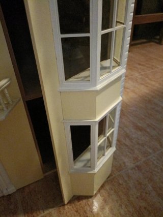 Casa de muñecas de madera