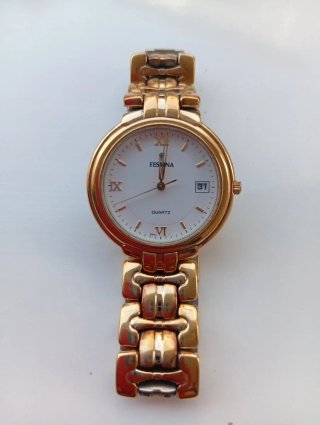 Reloj Festina Dorado y Blanco.tiene un baño de Oro
