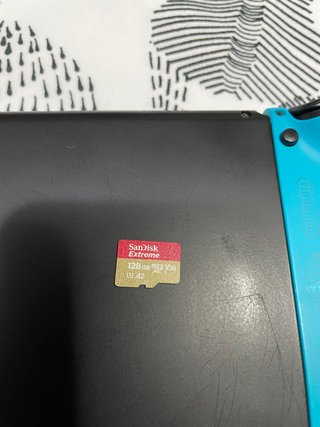 Nintendo Switch V2 (batería extendida) + accesorio
