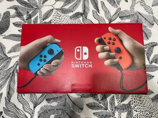Nintendo Switch V2 (batería extendida) + accesorio
