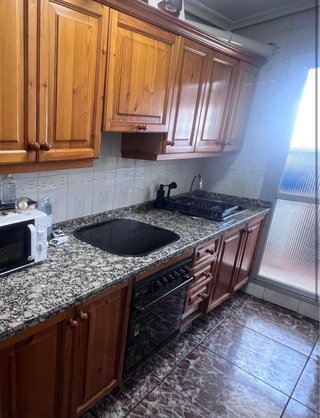 Cocina de madera y piedra