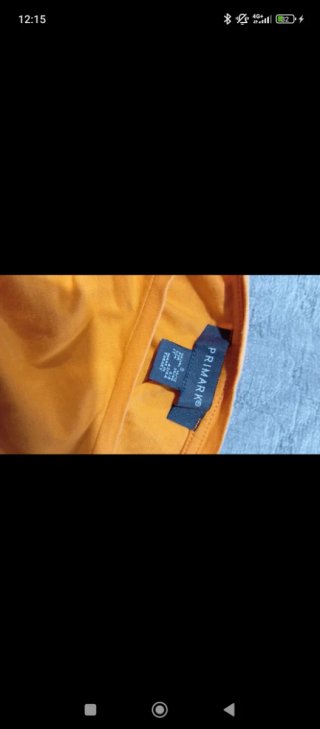 Camiseta naranja Primark estampada