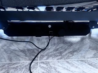 Cama articulada gris y blanca