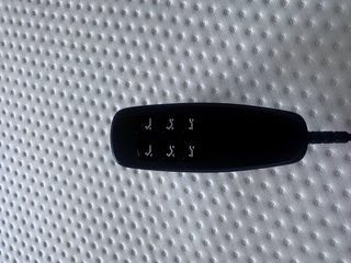 Cama articulada gris y blanca