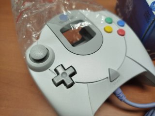 Mando Dreamcast sin usar en caja