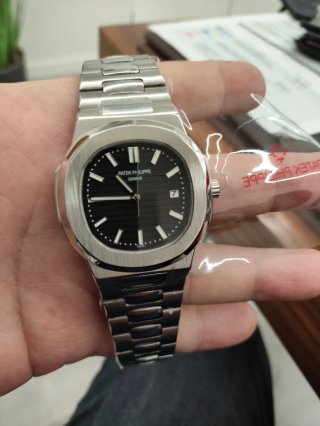Reloj automático plata/negro aún con precintos.