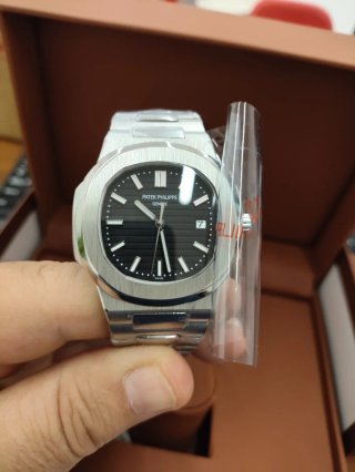 Reloj automático plata/negro aún con precintos.