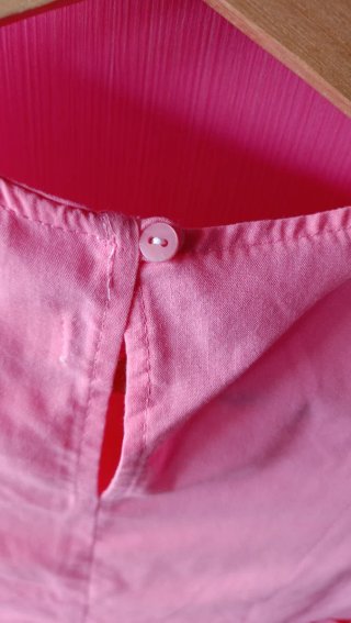 Blusa niña rosa con volante