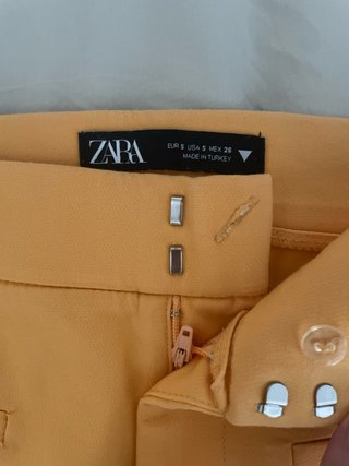 Pantaloni Zara arancioni a zampa