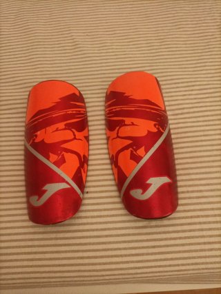 Espinilleras Joma Naranja y Rojo