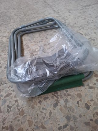 Taburete plegable de tela y metal