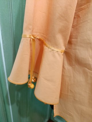 Maglia arancione con paillettes