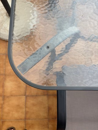 Mesa cristal y 4 sillas terraza