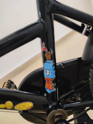 Bicicleta infantil 16" Btwin con ruedines y casco