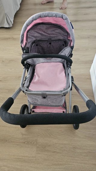 Carrito de bebé de juguete rosa y gris