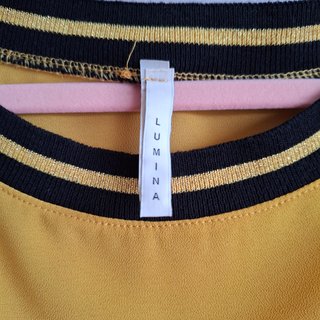 Blusa mostaza mangas murciélago