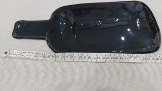 Svuota tasche in vetro soffiato forma bottiglia