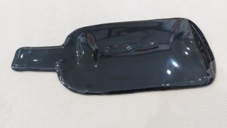 Svuota tasche in vetro soffiato forma bottiglia