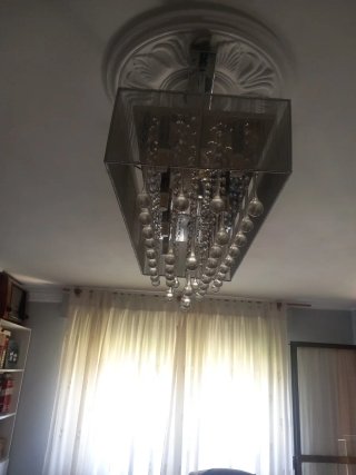 Lámpara de cristal y acero