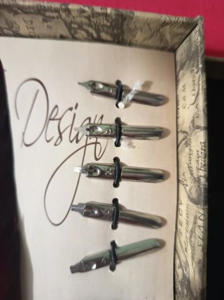 Set de pluma de escribir y tinta