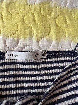 Top rayas nudo delantero