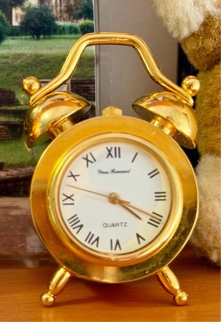 Orologi decorativi dorati