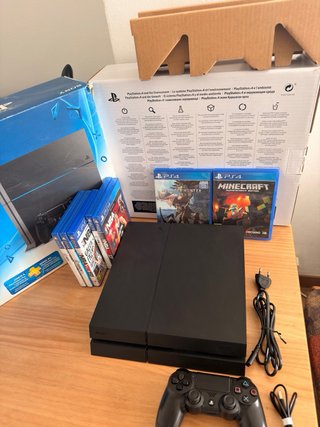 PS4 500GB + Mando + 12 Juegos (Caja)