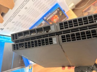 PS4 500GB + Mando + 12 Juegos (Caja)