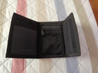 Cartera de bolsillo negra. Nueva a estrenar