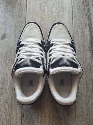 Scarpe trainers casual nere e bianche