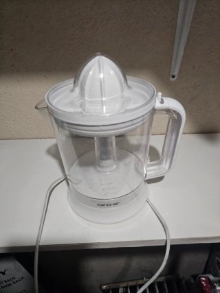 Exprimidor de Naranja Eléctrico