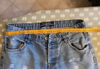 Jeans uomo blu strappati