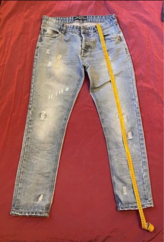 Jeans uomo blu strappati