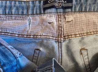 Jeans uomo blu strappati