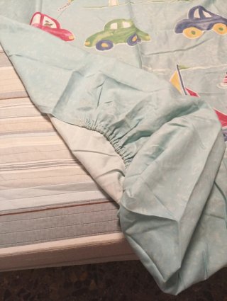 Colcha infantil con coches y barcos