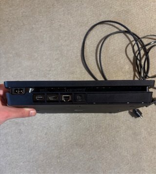 PS4 Slim 500GB + Mando Azul + Resident Evil 2